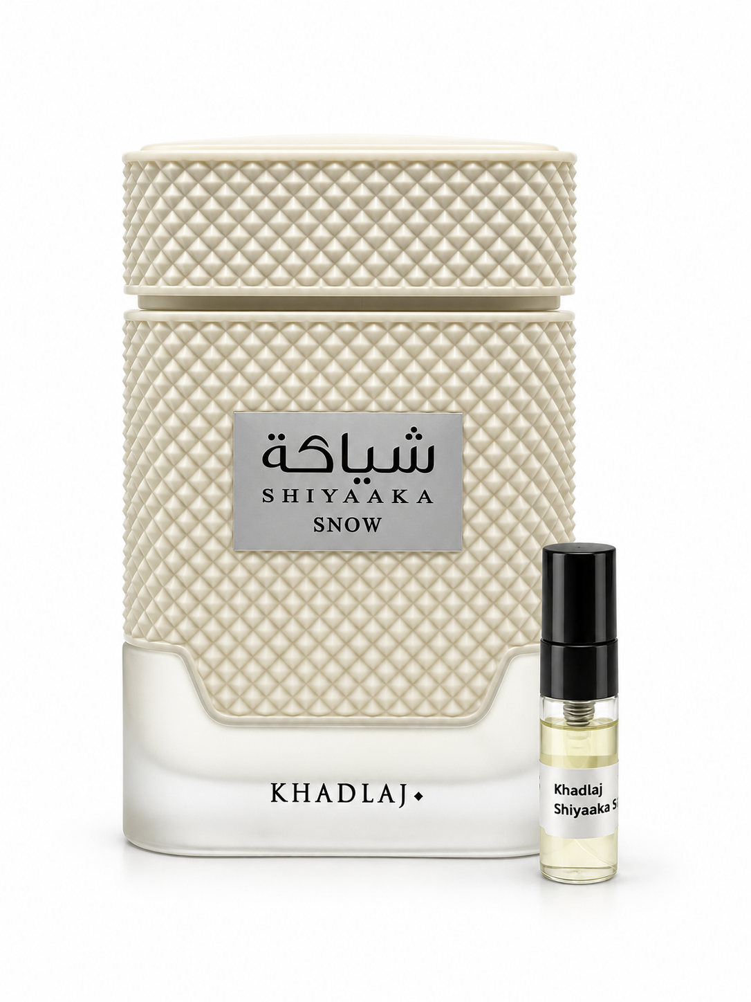 Khadlaj Shiyaaka Snow fragrance bottle and black-capped sample vial on white