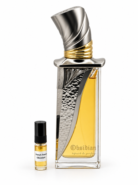 French Avenue Obsidian fragrance bottle and black-capped sample vial on white