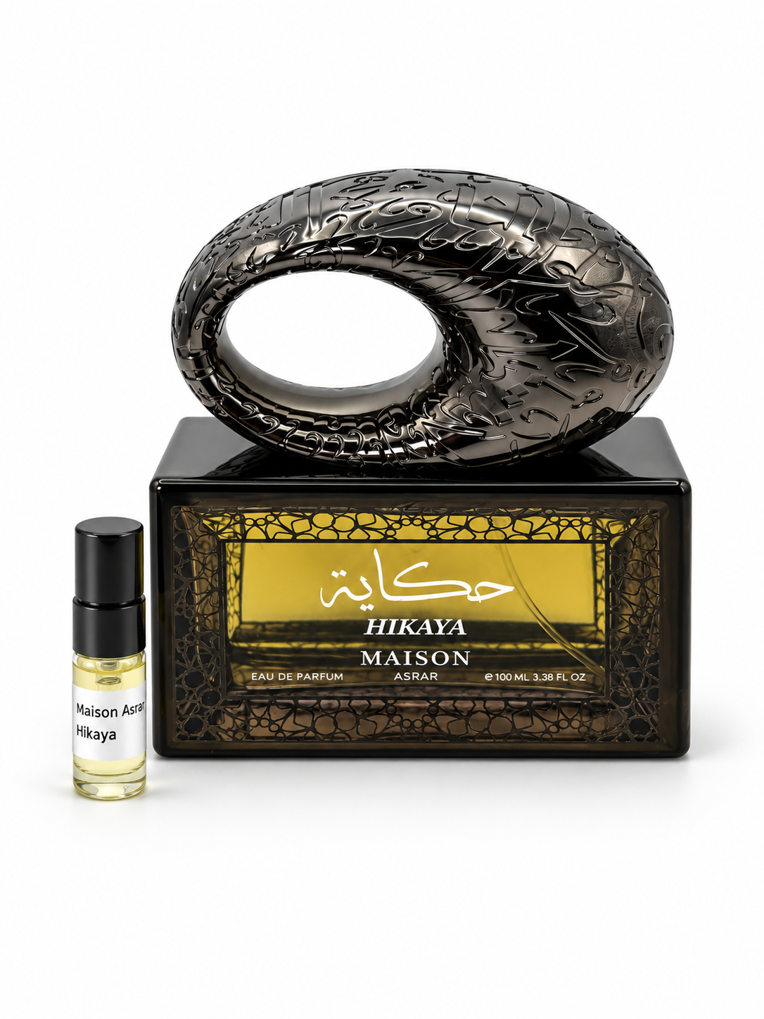 Maison Asrar Hikaya fragrance bottle and black-capped sample vial on white