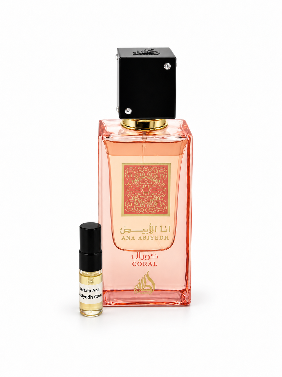 Lattafa Ana Abiyedh Coral fragrance bottle and black-capped sample vial on white