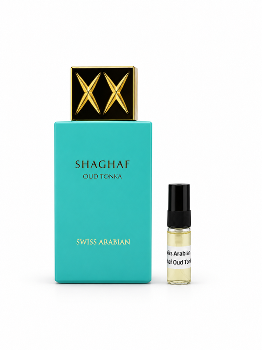Swiss Arabian Shaghaf Oud Tonka fragrance bottle and black-capped sample vial on white