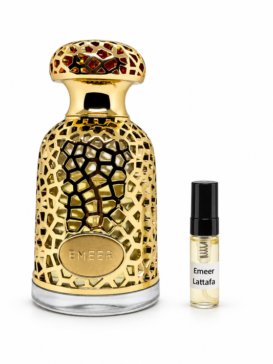 Lattafa Emeer fragrance bottle and black-capped sample vial on white