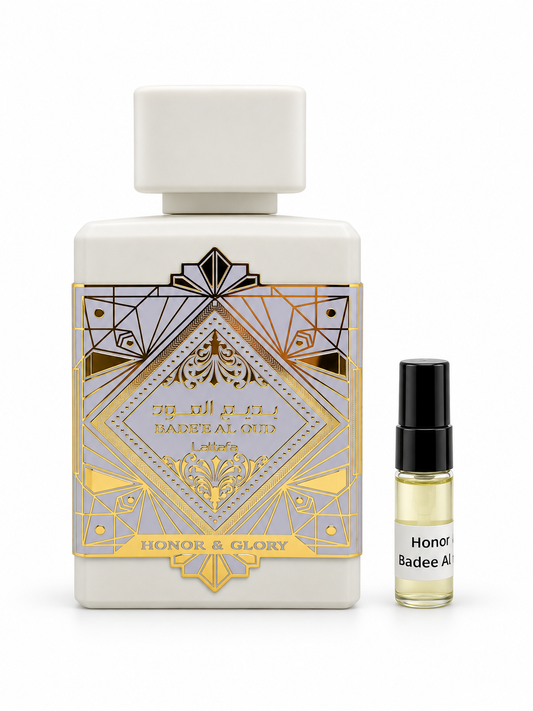 Lattafa Bade'e Al Oud Honor & Glory fragrance bottle and black-capped sample vial on white