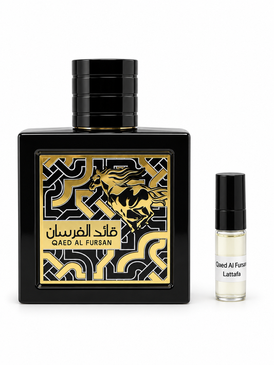 Lattafa Qaed Al Fursan fragrance bottle and black-capped sample vial on white