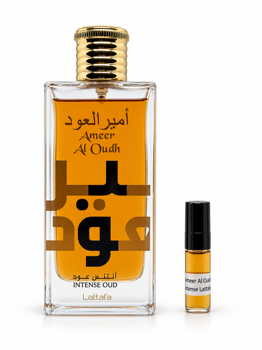 Lattafa Ameer Al Oudh Intense fragrance bottle and black-capped sample vial on white