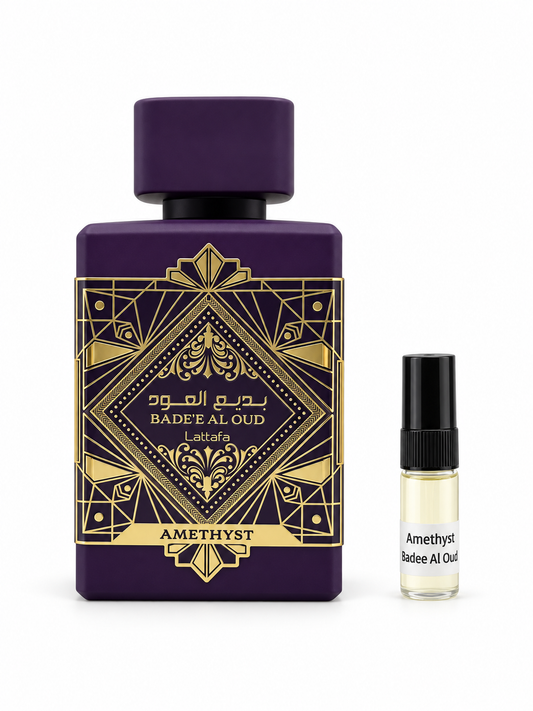 Lattafa Badee Al Oud Amethyst fragrance bottle and black-capped sample vial on white
