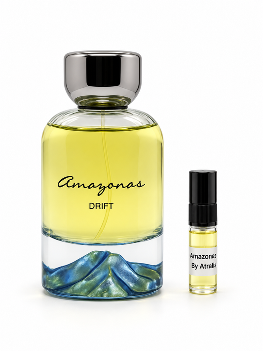 Atralia Amazonas Drift fragrance bottle and black-capped sample vial on white