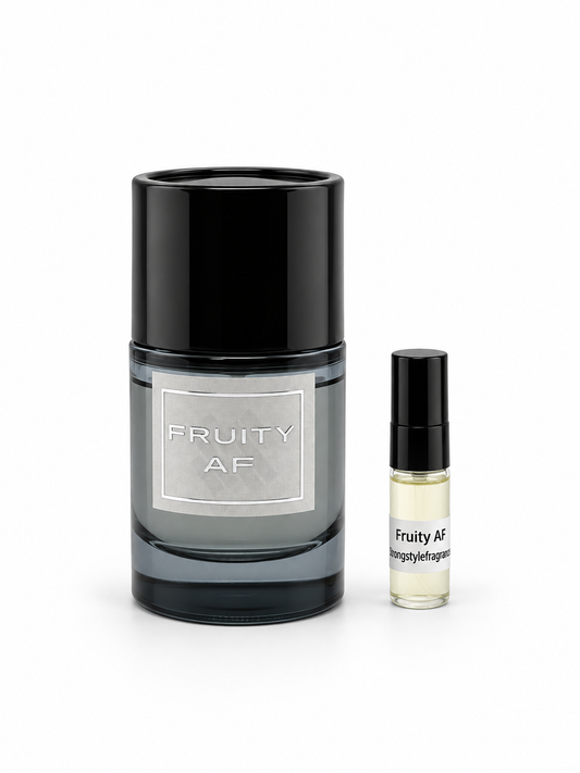 Strong Style Fragrances Fruity AF fragrance bottle and black-capped sample vial on white