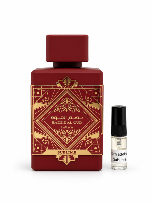 Lattafa Bade'e Al Oud Sublime fragrance bottle and black-capped sample vial on white