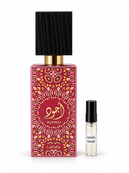 Lattafa Ajwad pink to pink fragrance bottle and black-capped sample vial on white