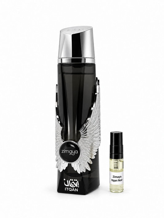 Zimaya Itqan Noir fragrance bottle and black-capped sample vial on white