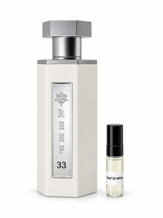 Reef 33 White fragrance bottle and black-capped sample vial on white