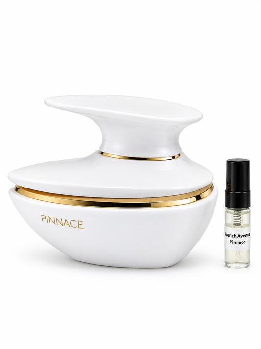 French Avenue Pinnace White fragrance bottle and black-capped sample vial on white