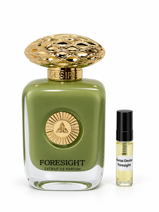 Auraa Desire Foresight fragrance bottle and black-capped sample vial on white