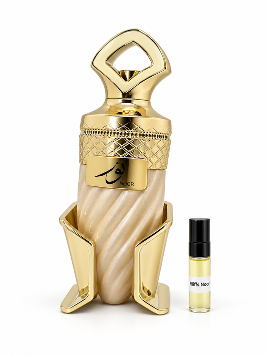 Riiffs Noor fragrance bottle and black-capped sample vial on white