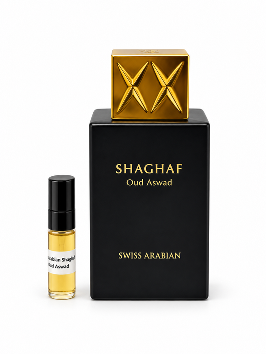 Swiss Arabian Shaghaf Oud Aswad fragrance bottle and black-capped sample vial on white