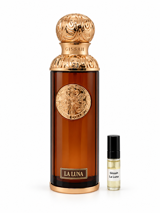 Gissah La Luna fragrance bottle and black-capped sample vial on white