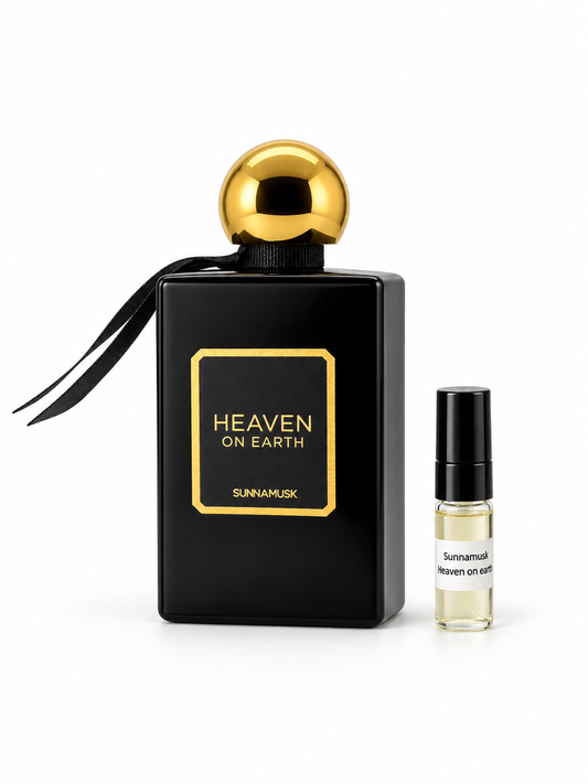 Sunnamusk Heaven On Earth fragrance bottle and black-capped sample vial on white