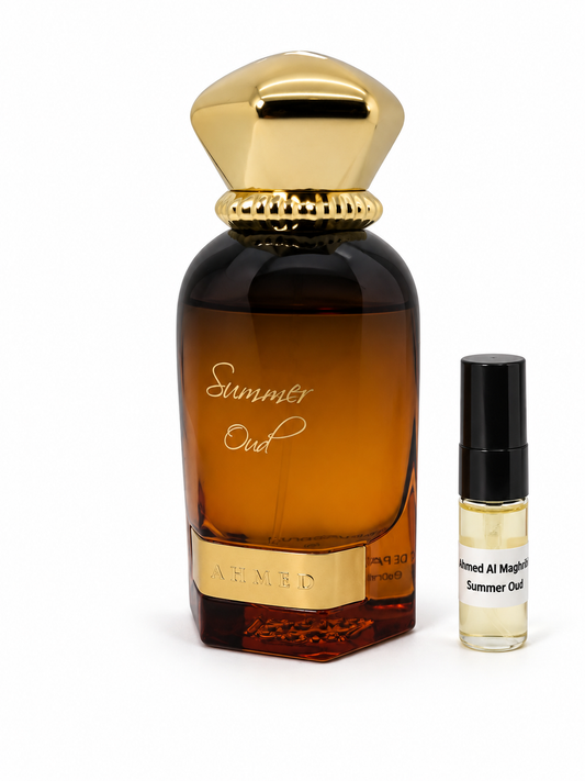 Ahmed Al Maghribi Summer Oud fragrance bottle and black-capped sample vial on white