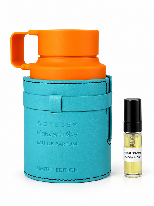 Armaf Odyssey Mandarin Sky fragrance bottle and black-capped sample vial on white