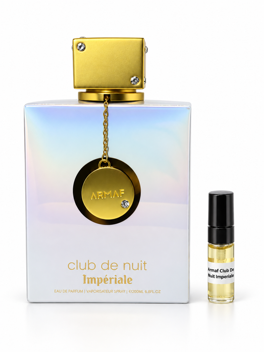 Armaf Club De Nuit Imperiale fragrance bottle and black-capped sample vial on white