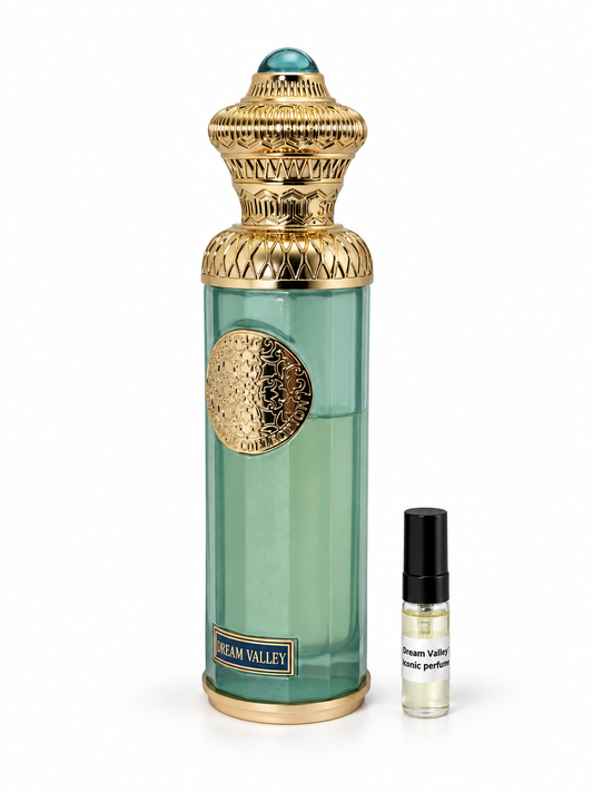 Surrati Dream Valley fragrance bottle and black-capped sample vial on white
