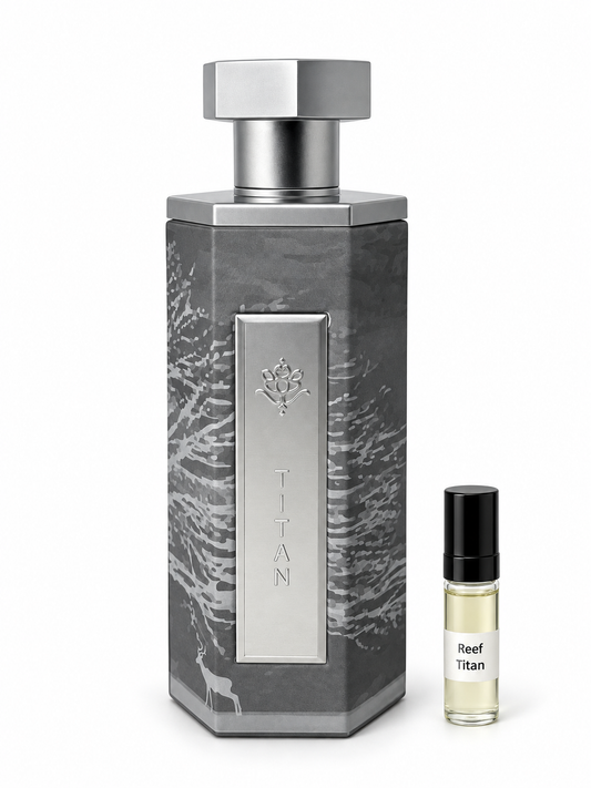 Reef Titan fragrance bottle and black-capped sample vial on white