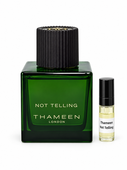 Thameen Not Telling fragrance bottle and black-capped sample vial on white