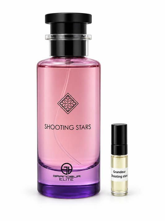 Grandeur Elite Shooting Stars fragrance bottle and black-capped sample vial on white