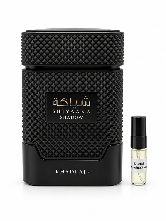 Khadlaj Shiyaaka Shadow fragrance bottle and black-capped sample vial on white