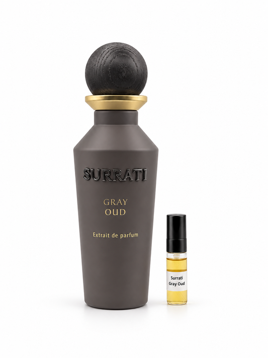 Surrati Gray Oud fragrance bottle and black-capped sample vial on white