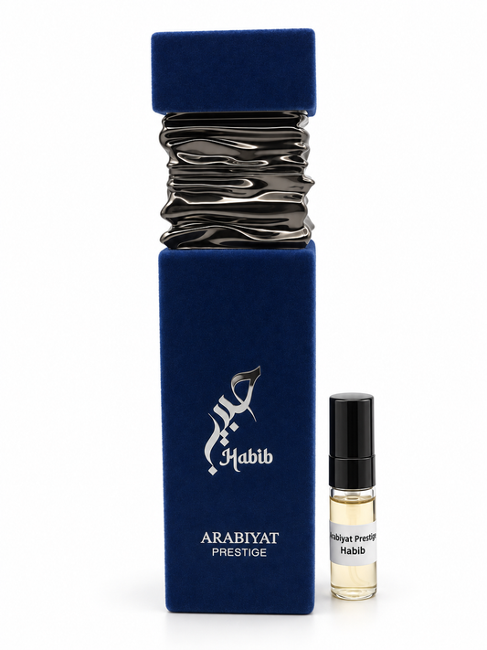Arabiyat Prestige Habib fragrance bottle and black-capped sample vial on white