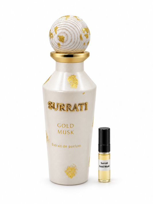 Surrati Gold Musk fragrance bottle and black-capped sample vial on white