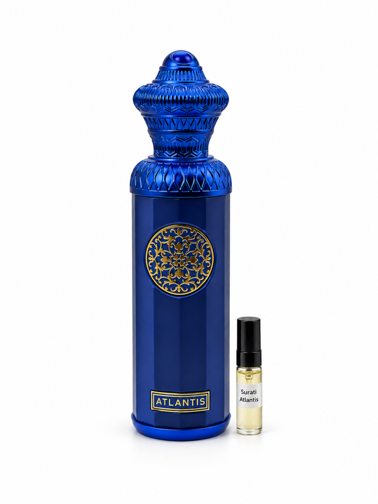 Surrati Atlantis fragrance bottle and black-capped sample vial on white
