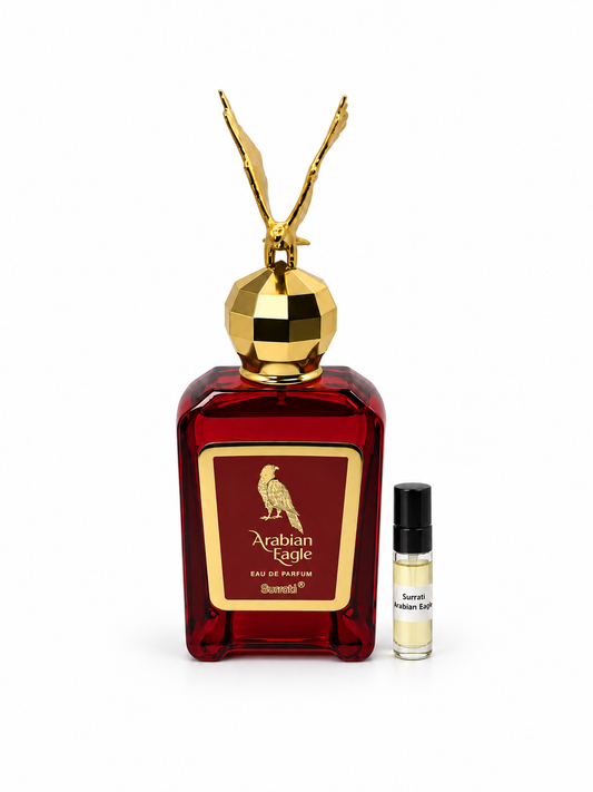 Surrati Arabian Eagle fragrance bottle and black-capped sample vial on white