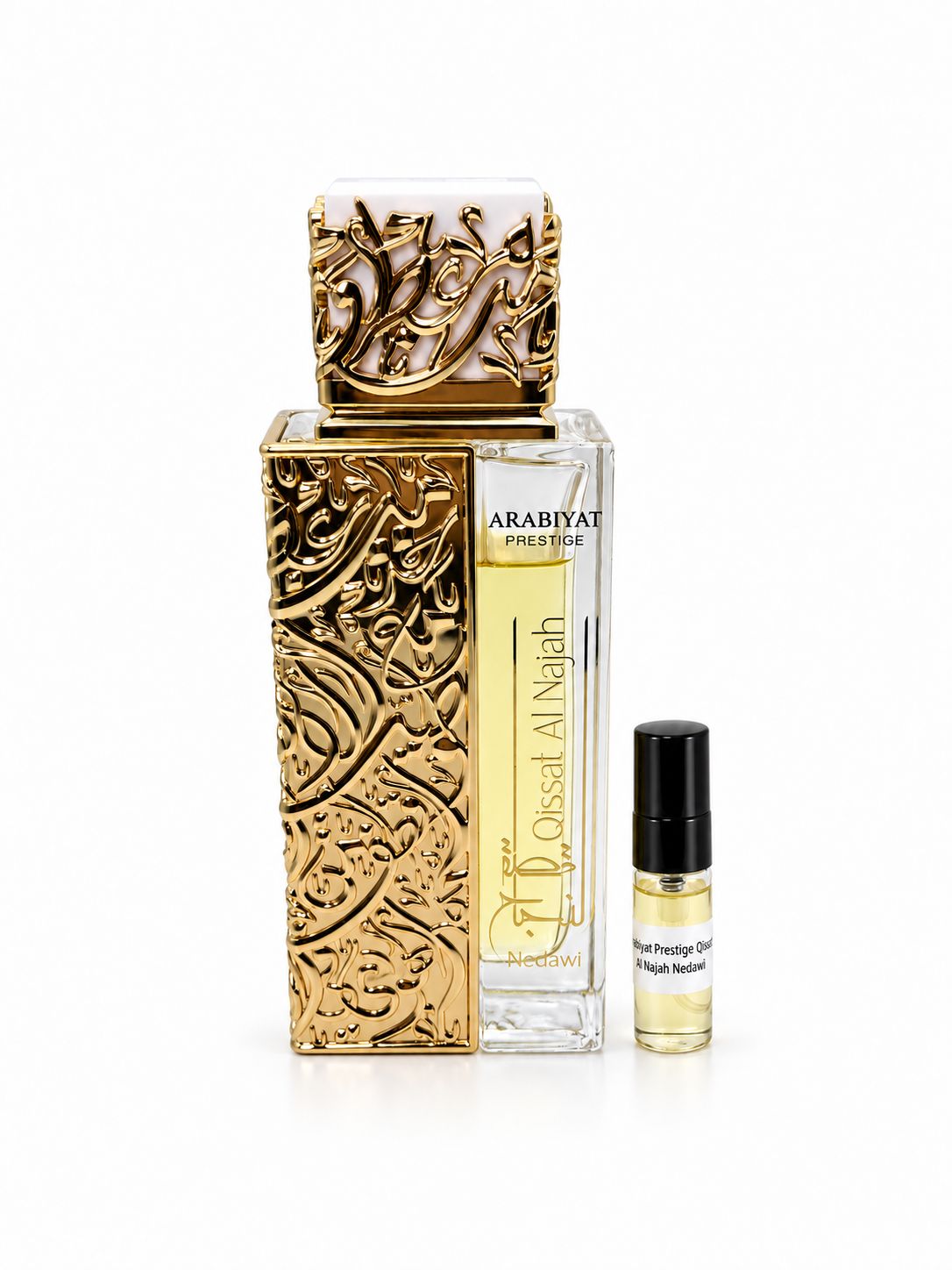 Arabiyat Prestige Qissat Al Najah Nedawi fragrance bottle and black-capped sample vial on white