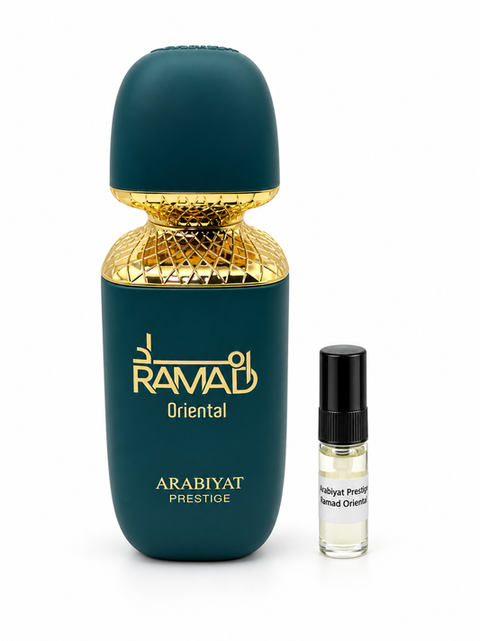 Arabiyat Prestige Ramad Oriental fragrance bottle and black-capped sample vial on white