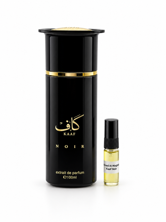 Ahmed Al Maghribi Kaaf Noir fragrance bottle and black-capped sample vial on white