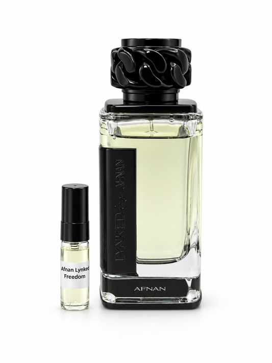 Afnan Lynked Freedom fragrance bottle and black-capped sample vial on white