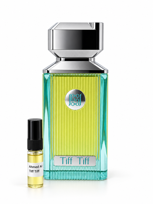 Ahmed Al Maghribi Tiff Tiff fragrance bottle and black-capped sample vial on white