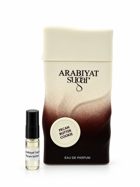 Arabiyat Sugar Pecan Butter Cookie fragrance bottle and black-capped sample vial on white