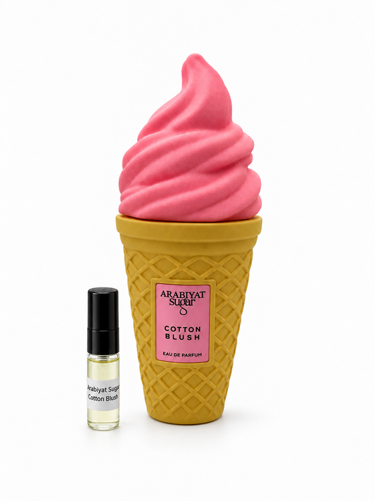 Arabiyat Sugar Cotton Blush fragrance bottle and black-capped sample vial on white