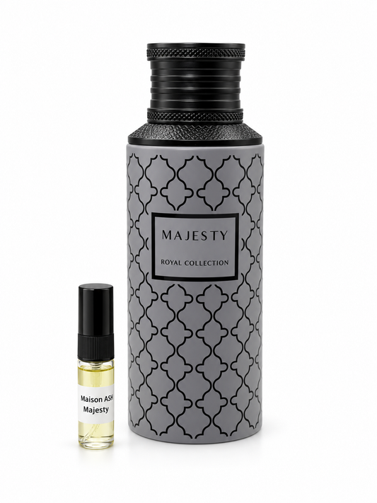 Maison Asrar Majesty fragrance bottle and black-capped sample vial on white