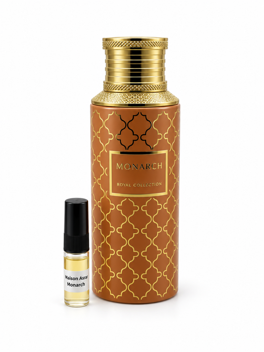 Maison Asrar Monarch fragrance bottle and black-capped sample vial on white