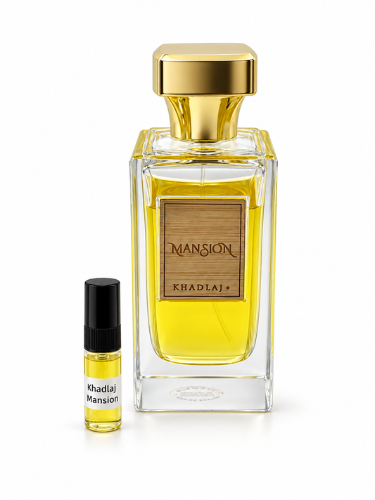 Khadlaj Mansion fragrance bottle and black-capped sample vial on white