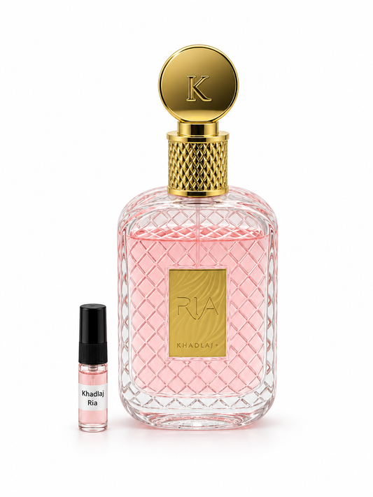 Khadlaj Ria fragrance bottle and black-capped sample vial on white
