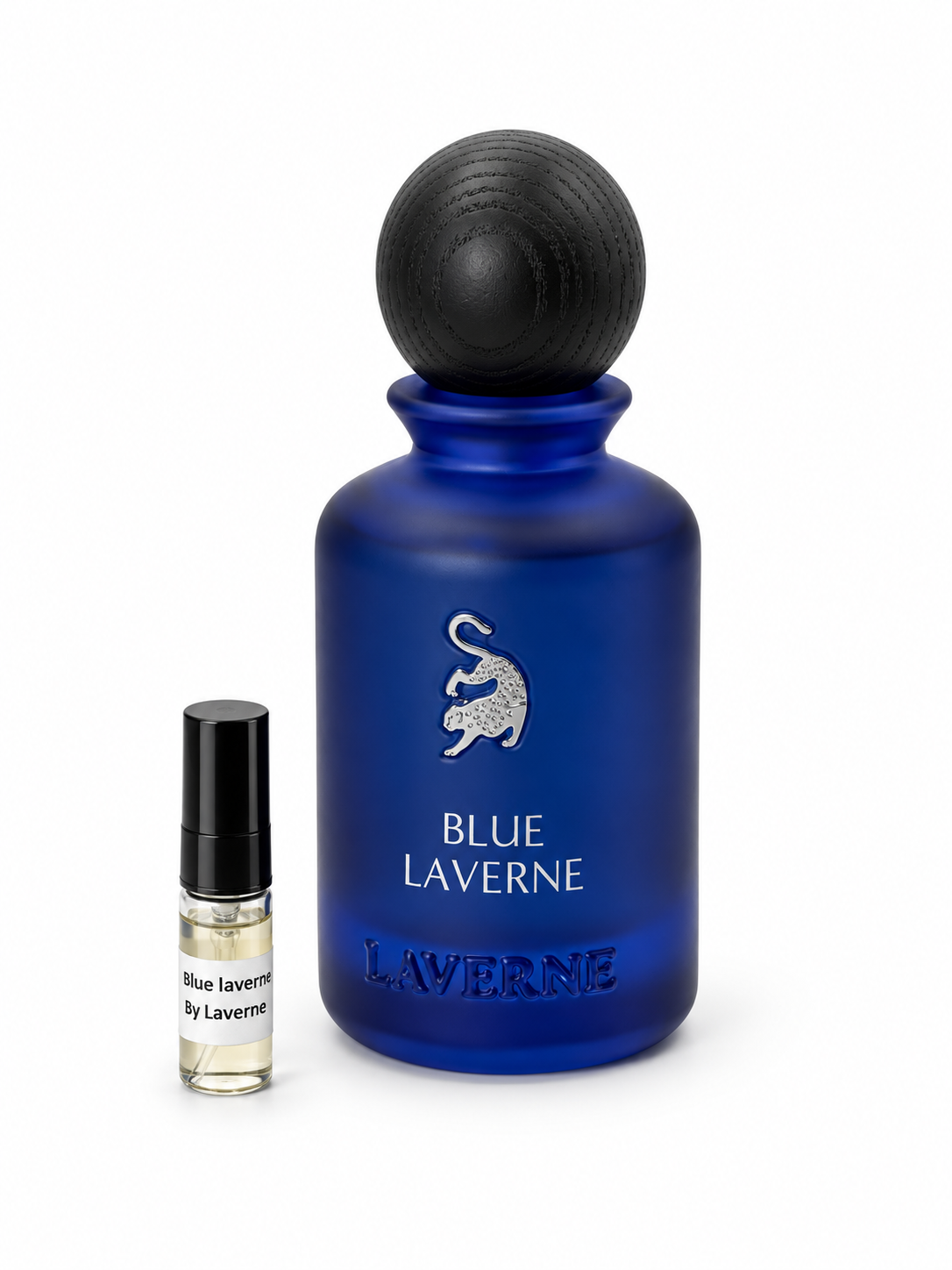Blue Laverne By Laverne fragrance bottle and black-capped sample vial on white