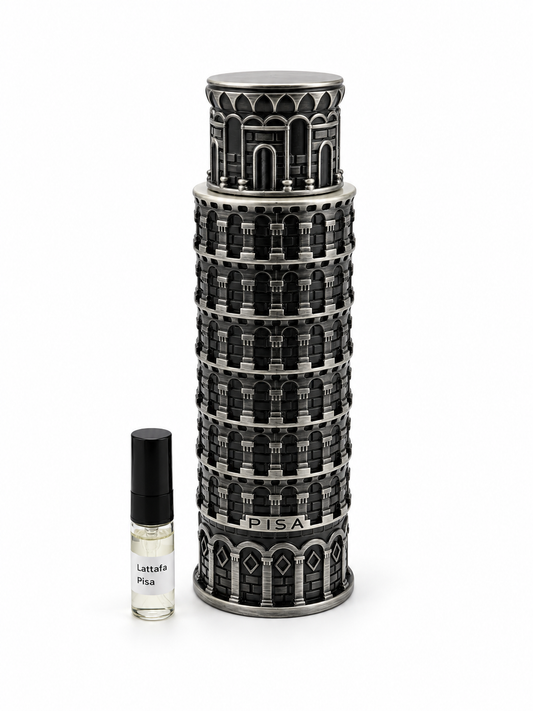 Lattafa Pisa fragrance bottle and black-capped sample vial on white