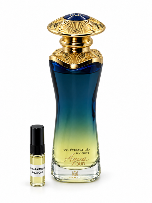 Ahmed Al Maghribi Aqua Oud fragrance bottle and black-capped sample vial on white