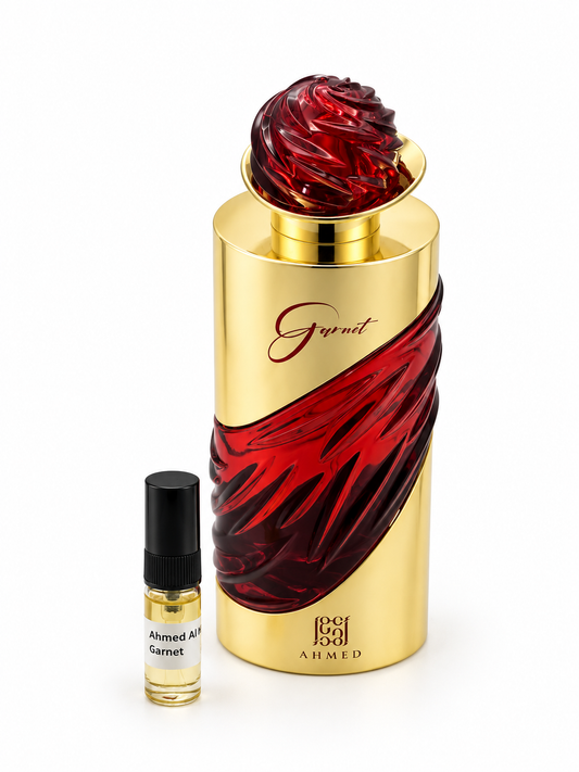 Ahmed Al Maghribi Garnet fragrance bottle and black-capped sample vial on white